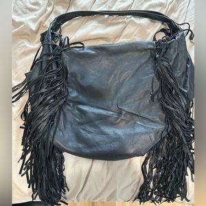 Genuine leather slouchy shoulder bag with fringe